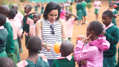 Kiran Fraser-Neve with local child