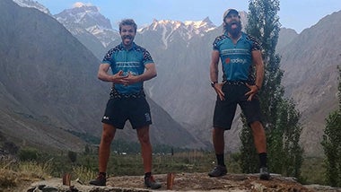 Hairy Handlebars pose on mountain