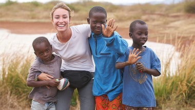 Myriam Gil with children in Tsavo