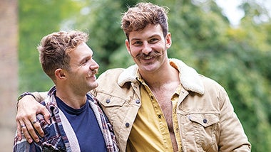 Ben Cook poses with arm around fellow Hairy Handlebar George Cullen